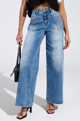 REVERSE REVERSE MEDIUM WASH JEANS