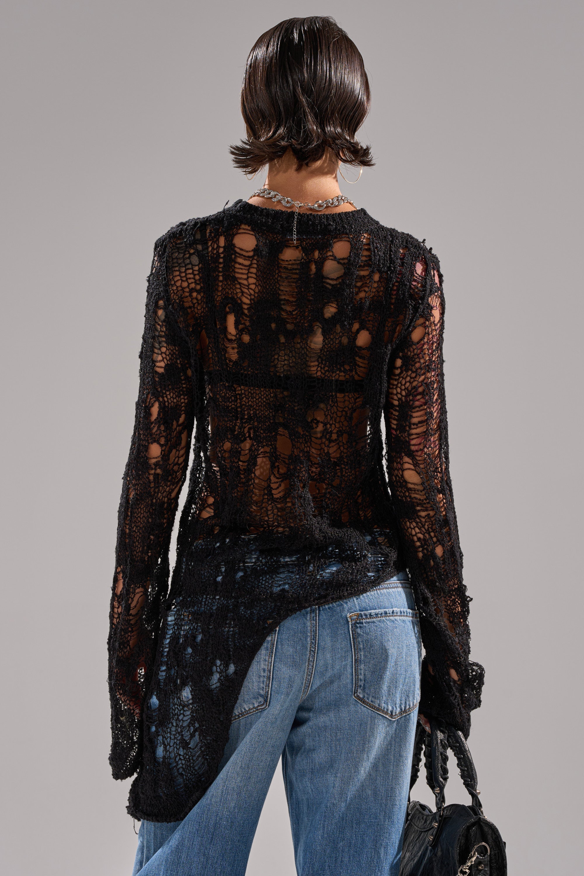 ASYMMETRICAL KNIT SWEATER