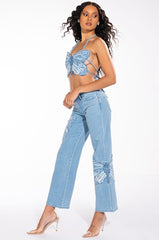 INFINITY BUTTERFLY DETAIL MID RISE WIDE LEG DENIM